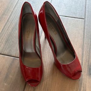 Red peep toe heels